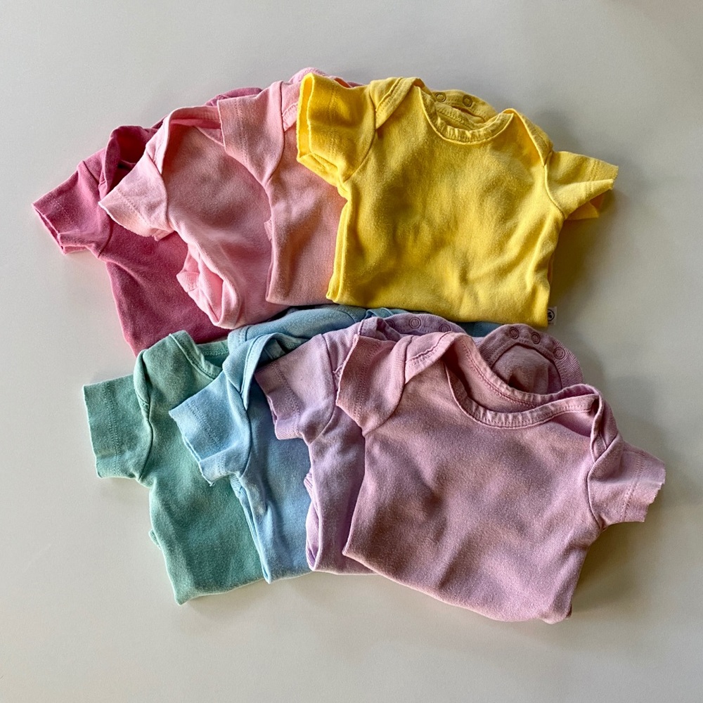 8 Short-Sleeved Newborn Onesies